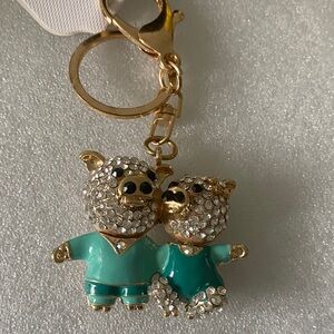 Gold and Teal pigs Keychain